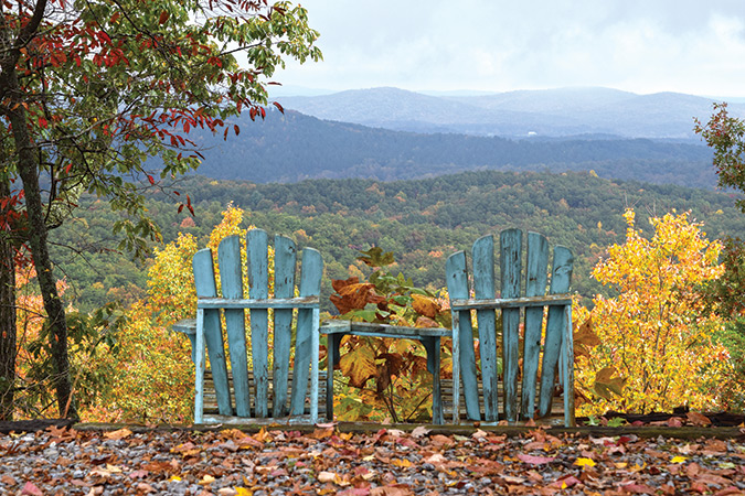 Among Ellen Honeycutt's favorite places to relax, as above with a view of the North Georgia Blue Ridge, are spots where she can guess the trees by their fall leaf color.