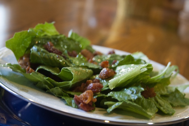 Killed lettuce is given much of its distinct taste by well-heated vinegar-sugar dressing.