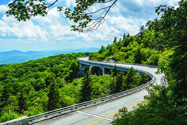 The Blue Ridge Parkway’s signature structure, the Linn Cove Viaduct, helps lure visitors.