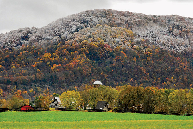 Bucky Cooper Park in Church Hill, Tennessee, offers a view of a small farm in an adjacent field. It had snowed a little bit the night before in the higher elevations, which gave a nice contrast to the fall foliage.