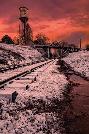 It’s Christmas Eve 2020 and that cold white powder began to fall from the sky, it helped to create this beautiful scene in the small town of Jasper, Georgia. From the photographer: “This was the first white Christmas the North Georgia Mountains had seen in 10 years. As I set up to capture the snowy cityscape, the snow and clouds gave way to this beautiful sunset. As you enter from the north end of the city you are given this view of the historic Woodbridge Inn and the bridge from which it gets its name. I really enjoy this location because it represents part of the vast history of this quaint little mountain town.”