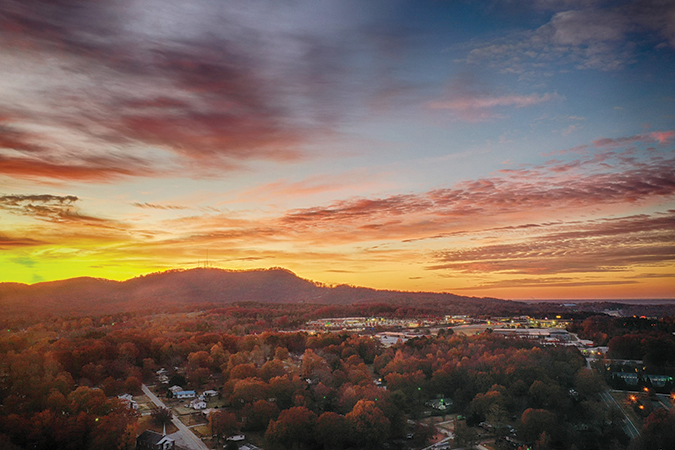 Aerial view of Travelers Rest highlights the beauty of the city and Paris Mountain on the horizon.