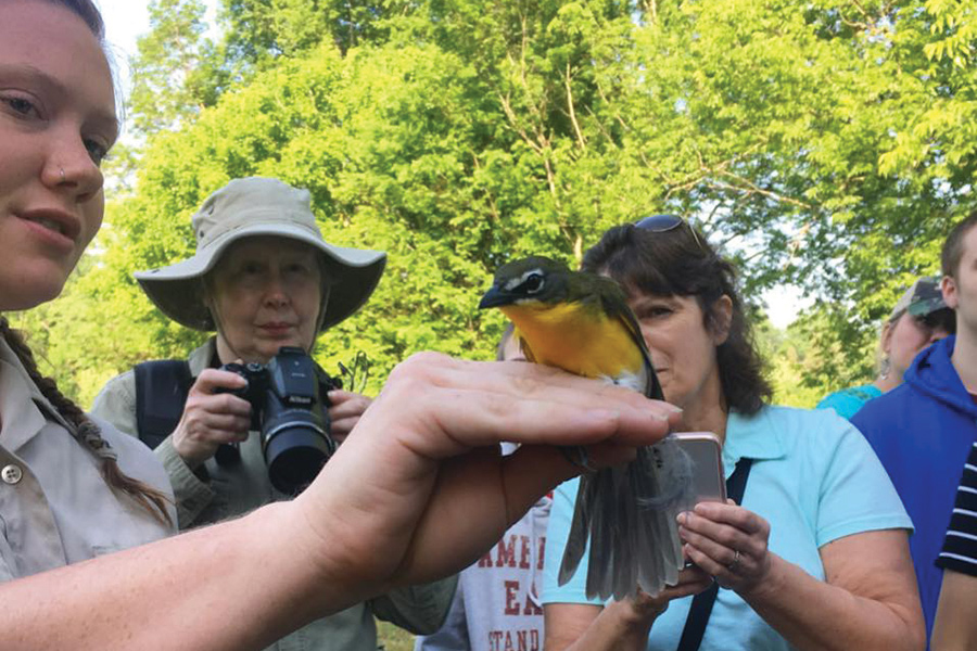 A ranger introduces visitors to one of the 200 bird species at Tennessee’s Seven Islands State Birding Park.