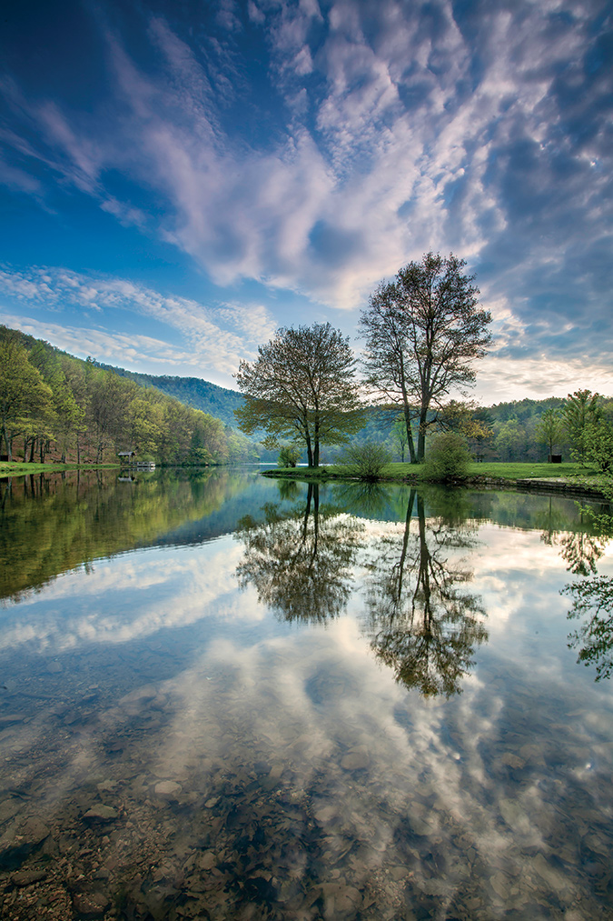 Sherando Lake, near Stuarts Draft, Virginia, has beautiful hiking trails and sunrises as the sun crests over the Blue Ridge. The morning that photographer Brent McGuirt was there, he waded in, waited a few minutes and got this shot of the mackerel clouds reflecting in the lake.