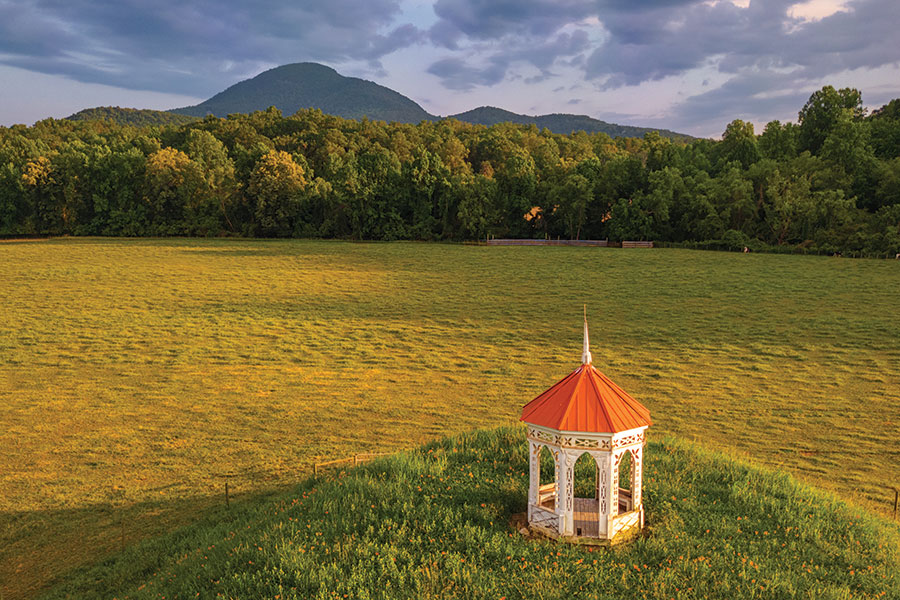 The Sautee Nacoochee Indian Mound archaeological site, with Mt. Yonah in the distance, is one of the lures of Sautee Nacoochee, Georgia.