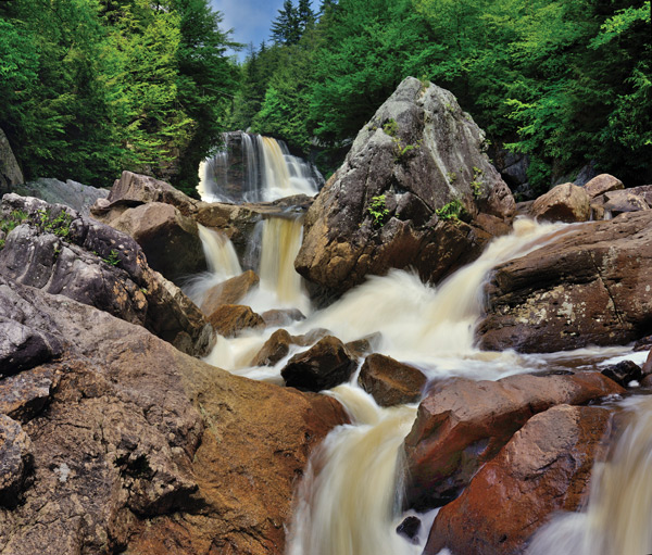 Blackwater Falls is the primary attraction at the state park of the same name; falls is here seen from below instead of from the more-often seen perspective from the platform near the top.