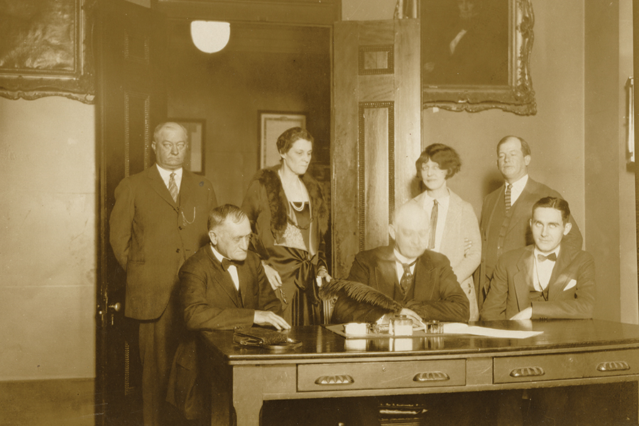 Gov. Austin Peay signed the legislation authorizing the purchase of Little River Company land. Left to right: Jeff Hunt, acting secretary to the governor; Speaker of the Senate Judge L. D. Hill; Representative Anne Davis; Gov. Peay; Mary Virginia Cox of the governor’s office; Representative W. B. Hatcher; and Speaker of the House W. F. Barry, Jr.