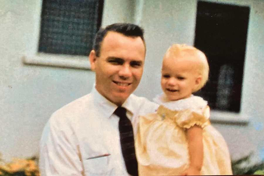 Dr. Edwards holds daughter Harriet in 1959.