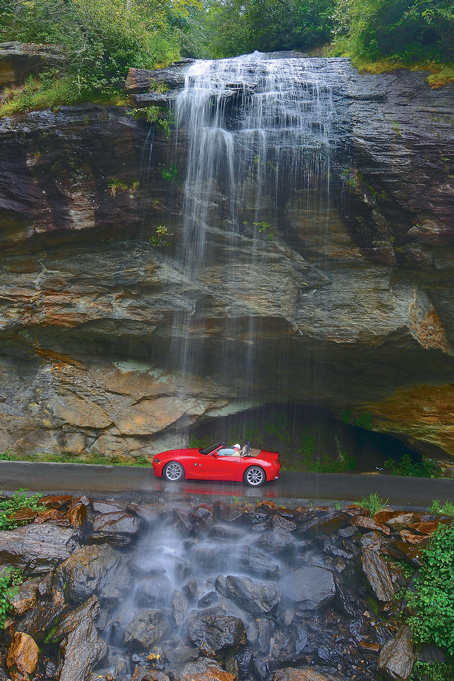 Sixty-foot Bridal Veil Falls, near Highlands, North Carolina, has long been celebrated as the state’s only falls you can walk or drive behind. From the photographer: “I have fond childhood memories of collecting garnet gemstones there. In this shot, I set up my camera and tripod to photograph the falls when this red BMW came along. I rarely include people or automobiles in my landscape images, but this time was an exception.”