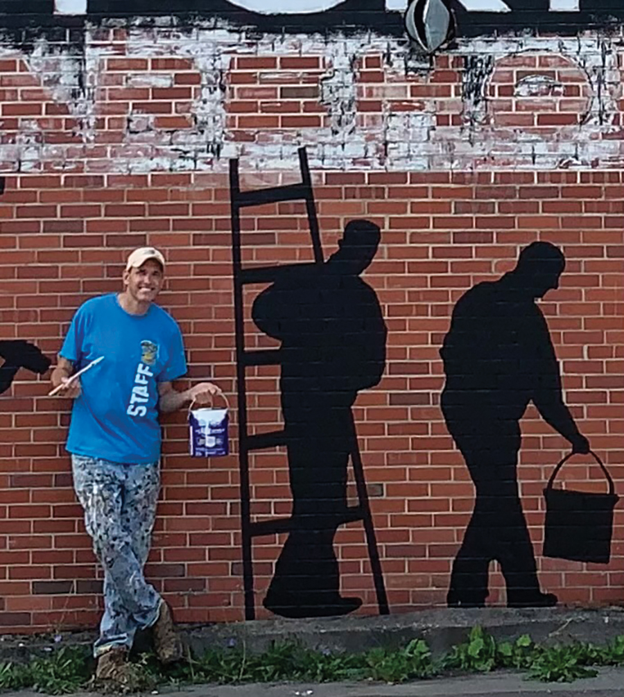 Greg Puckett is both a county commissioner and  Mercer Street painter.