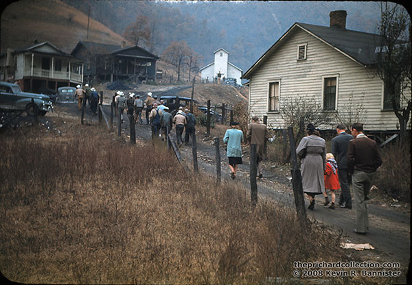 People attending a funeral at the first Delbarton Church of God on the hill, now Walnut Street, in Delbarton across from Willam Ann Coal Camp, 1948. Photo courtesy of The Prichard Collection.