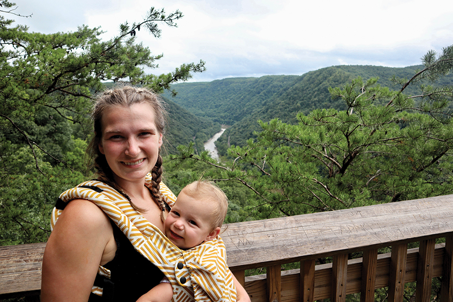 Mother and daughter share a moment far above the New River Gorge.