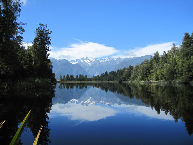 Gail's best shot of the trip? It's over Lake Matheson, looking toward Mt. Cook and Mt. Tasman.