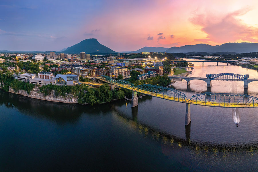 Chattanooga, Tennessee, is embraced by the flow of the Tennessee River. Lookout Mountain looms on the horizon.