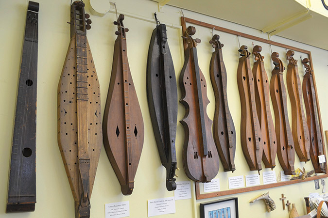 On display inside May's shop are authentic historic instruments, about which Warren happily shares information on styles, woods and techniques through time.
