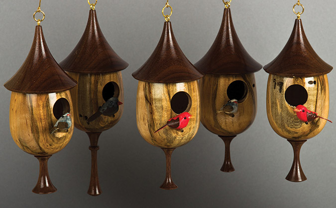 Walnut and maple birdhouse ornaments.