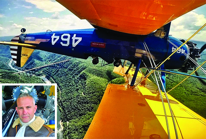Chris Kappler (inset) does a loop-de-loop over West Virginia’s New River Gorge for a Wild Blue Adventure customer in his restored 1943 Boeing Stearman. With each aerial tour, pilot Chris Kappler is transformed into a World War II flying ace.