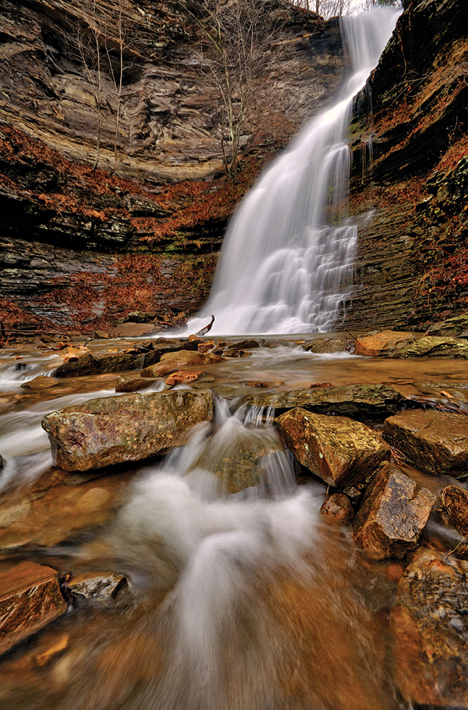 Cathedral Falls is located at a roadside rest stop on U.S. 60 one mile east of Gauley Bridge in West Virginia. From the photographer: “Descending 60 feet in a series of three dramatic drops within a large semicircular rock amphitheater, Cathedral Falls is a delight to photograph and also a favorite wedding venue.”
