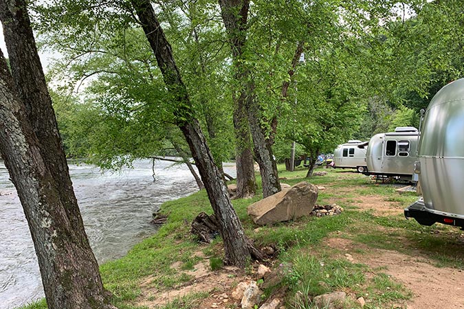 Airstream trailers along the Tuckasegee River.