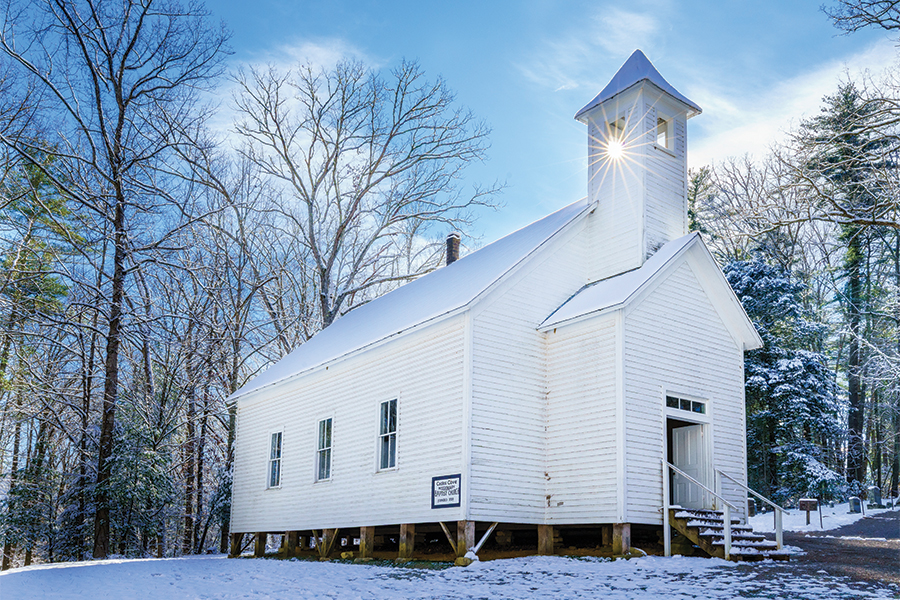 Tennessee’s Cades Cove Missionary Baptist Church, founded in 1839. From the photographer: “I have photographed this church over the years but rarely with fresh snow. I waited patiently for the sun to crest the steeple and clicked the shutter.”