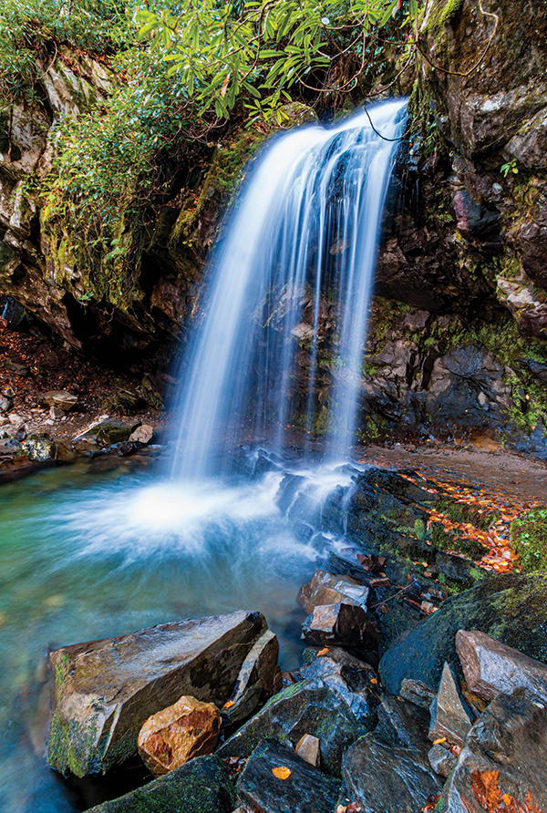 Standing behind Grotto Falls will make you feel delightedly differently about waterfalls.