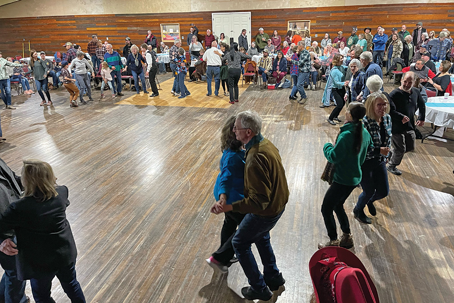 At Suzie Nixon Flaherty’s Mountain City Playhouse, guests clog and buck dance to live music in the restored auditorium.