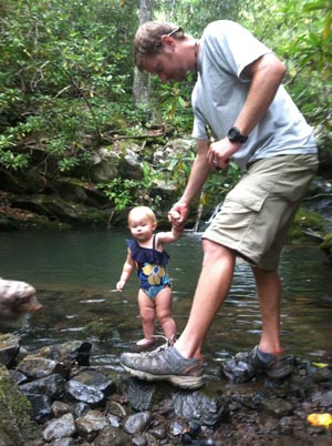 Little Reese didn't jump in, but did get into the cold water, while Daddy Ben jumped in later.