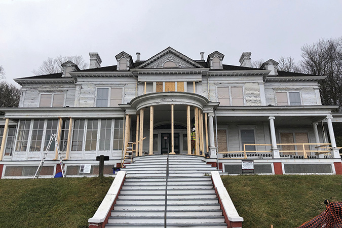 The weathered exterior of the mansion at the Moses Cone Memorial Park undergoes restoration and transformation. Completion is expected by the end of 2021.