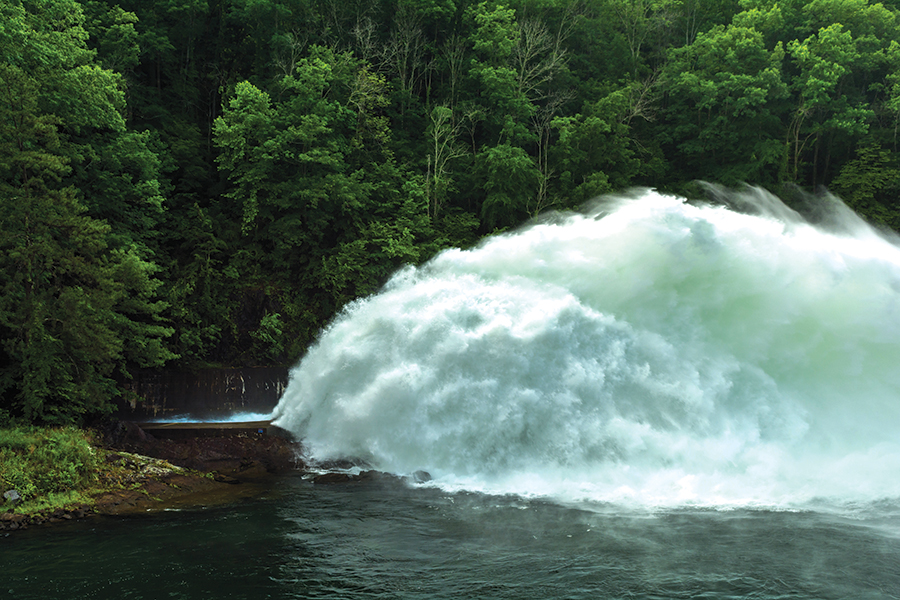 Fontana Dam spillway releasing water to reduce water levels at Fontana Lake.