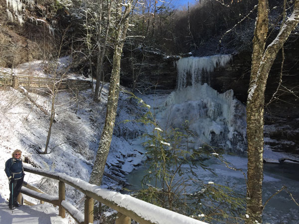 Gail at The Cascades, before the snow got deep enough to reveal . .. cat tracks!