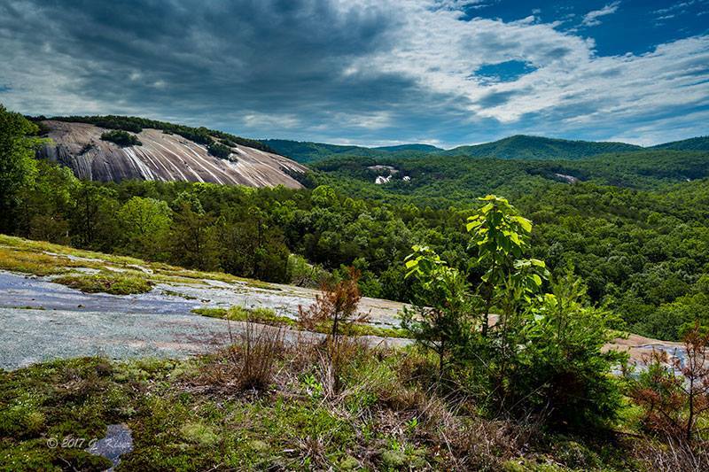 This is "Mountains Cry" which was shot from Cedar Rock in Stone Mountain State Park. What makes this image so special is with all of the recent rains, there are little streams of water pouring off of the face of the mountain. With the sun hitting it from the back side of the cloud bank, it really highlights the water. This was some of the more dramatic conditions I've found at this view. You can view more of my work at www.gkiserphotography.com or on Facebook at Greg Kiser Photography