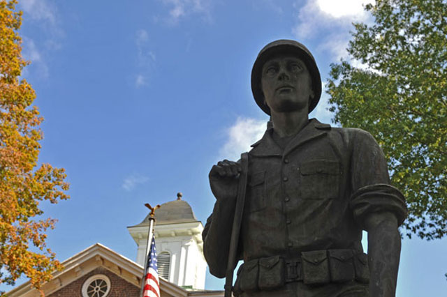 A soldier stands frozen in time at the war memorial outside the Loudon County courthouse.