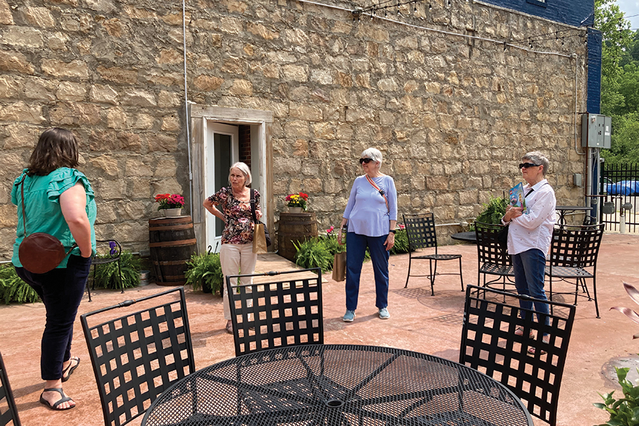 Hazard Downtown Development Coordinator Bailey Richards shows off the ArtStation Courtyard.
