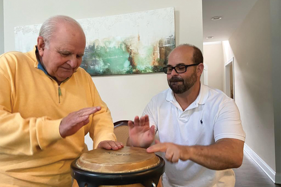 Tony Fraga and his son Alex play the bongo on Tony’s last Father’s Day, in 2022.
