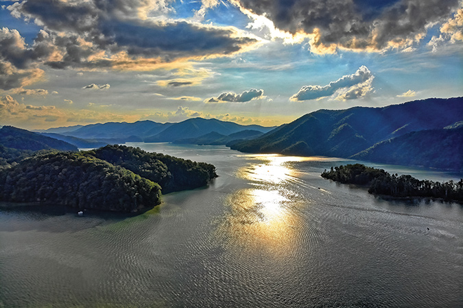 This drone’s-eye view of Watauga Lake in Carter County, Tennessee was taken near the Butler Bridge looking east into Johnson County. Nestled in the mountains of Northeast Tennessee, Watauga is the highest-elevation lake on the TVA system, at 1,959 feet above sea level. Photographer Ryan Rice has been visiting it and admiring its beauty since he was a young child.
