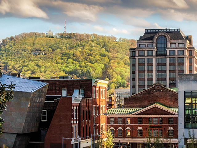 Roanoke’s architecture reflects its personality: brick marked with the patina of years, neighbors to contemporary glass asymmetry, all reflecting and surrounded by the green of trees and mountains.
