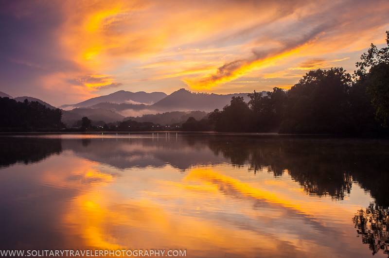 Sunset reflections on Lake Junaluska, near Waynesville, NC. Feel free to share, and you can see more at Solitary Traveler Photography. © 2016 Robert Stephens, All Rights Reserved