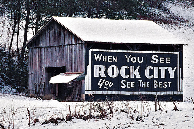 On U.S. Highways 411/441 about three miles south of Sevierville, Tennessee. Very well preserved and still looks as it did in the book.