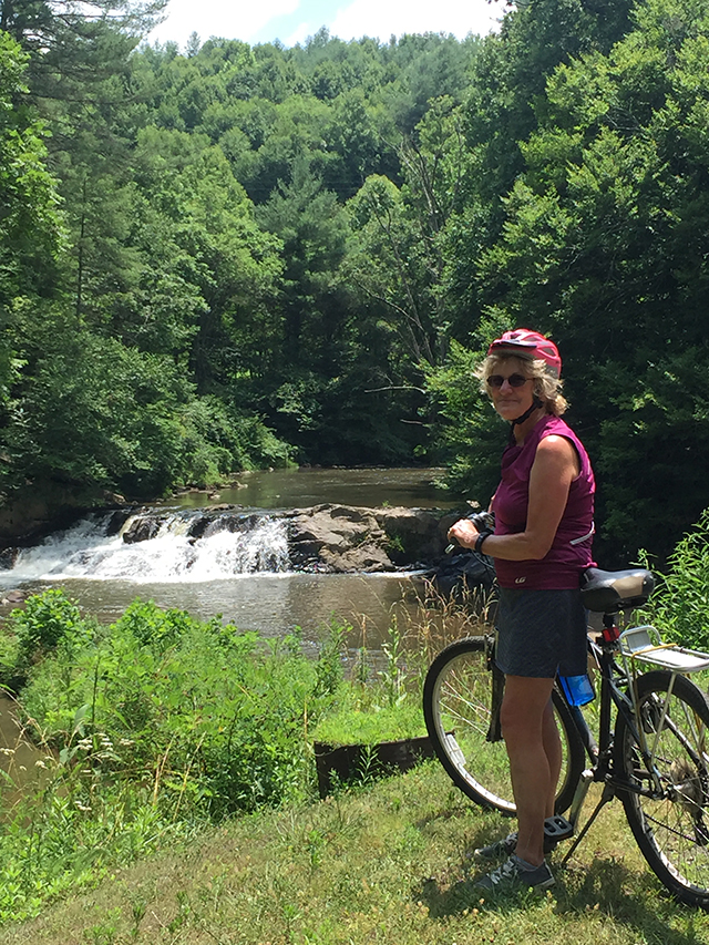 Gail pauses at a falls along the New River Trail.