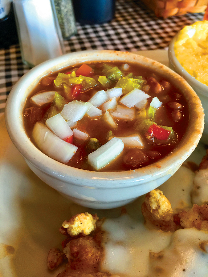 Soup beans are topped with onions and chow-chow at The Moose Café, Asheville.