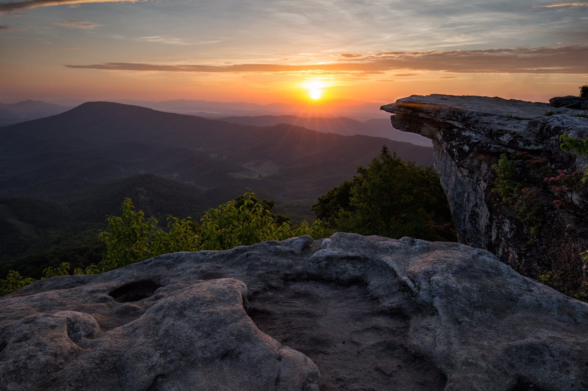 Mcafee Knob sunrise. This stretch of the Appalachian trail is especially beautiful right now with the mountain laurels in bloom. This is one of my favorite views in Appalachia that definitely rewards you for the effort.
http://www.jeremyriffephotography.com/