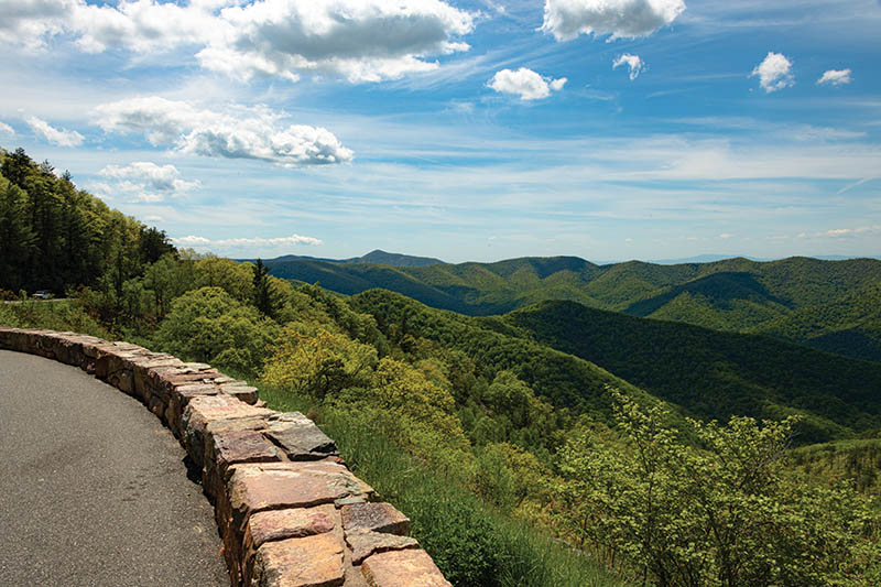 At 2,860 feet, Rockytop Overlook near milepost 78 on Skyline Drive offers sweeping views of green peaks.