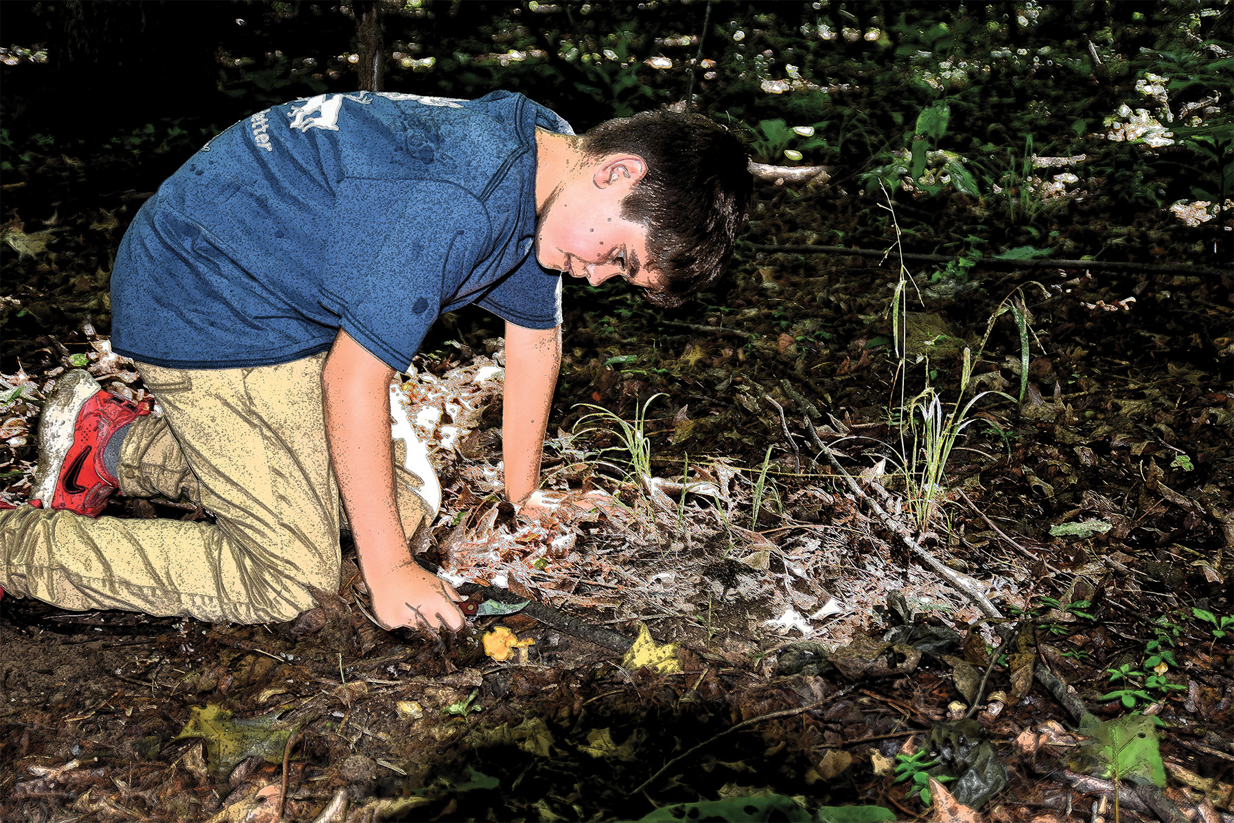 Eli severs a smooth chanterelle from the ground.