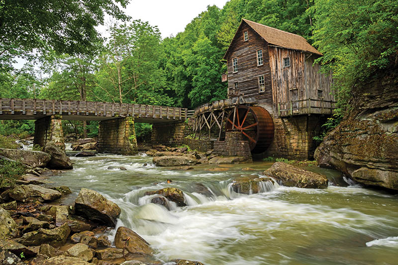Nestled along the flowing waters of Glade Creek in Danese, West Virginia, Glade Creek Grist Mill stands as a timeless symbol of Appalachian history, framed by dense forest and the serene beauty of Babcock State Park. Photo by Joshua Moore
