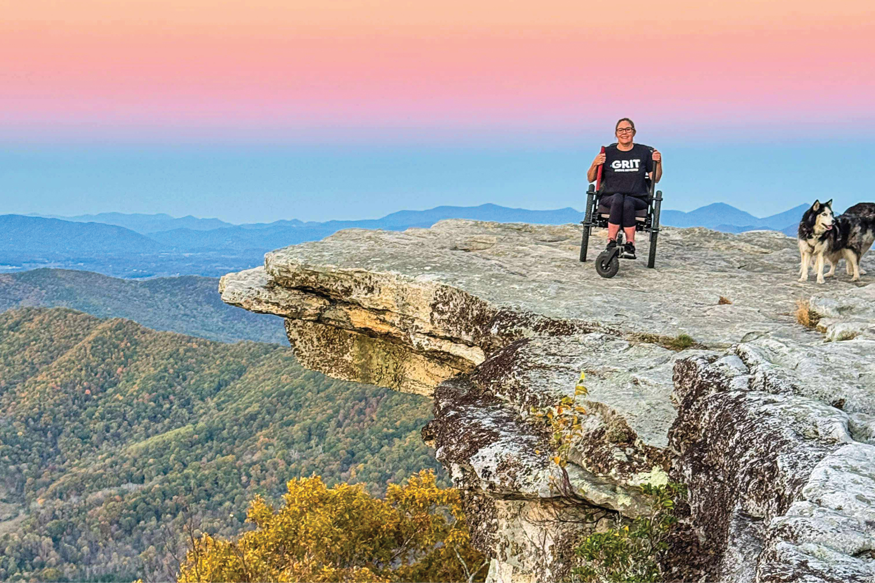 Carly Pearson smiles at the summit of McAfee Knob in Virginia