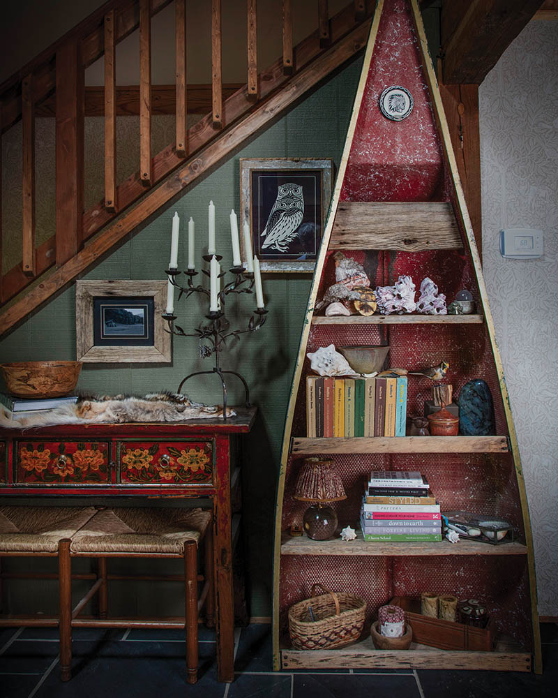 Aaron Mittel, Leach’s partner, finds canoes and turns them into canoe shelves. The shelves of this canoe are barn siding he found in an old schoolhouse.