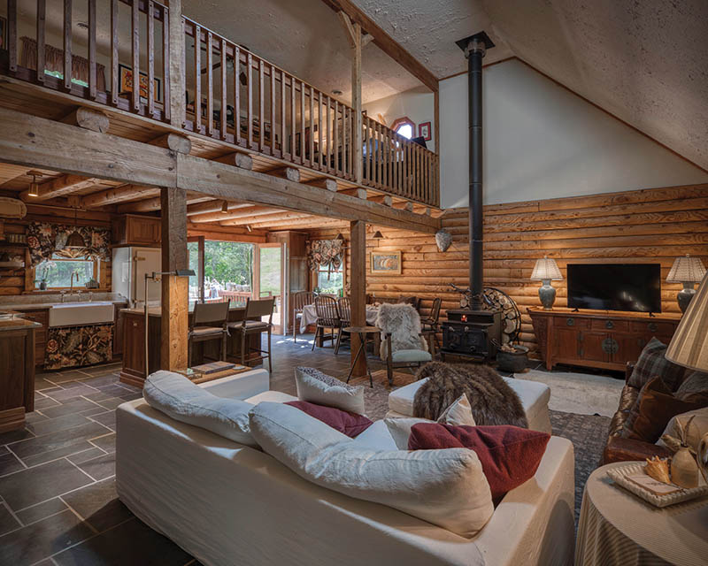 concept living area that opens onto the deck through a pair of French doors.