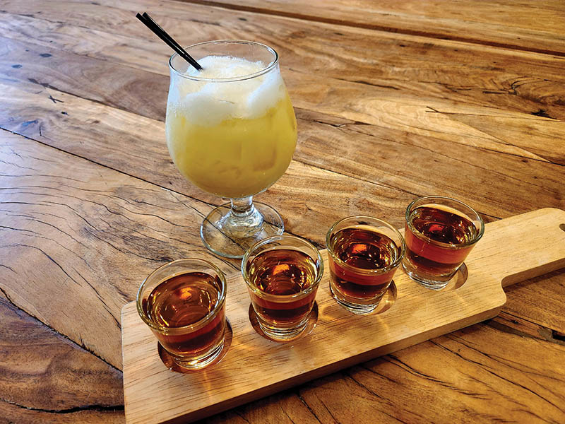 Bourbon flights and The Canary, a tasty rum-based cocktail, are tributes to the former first lady.