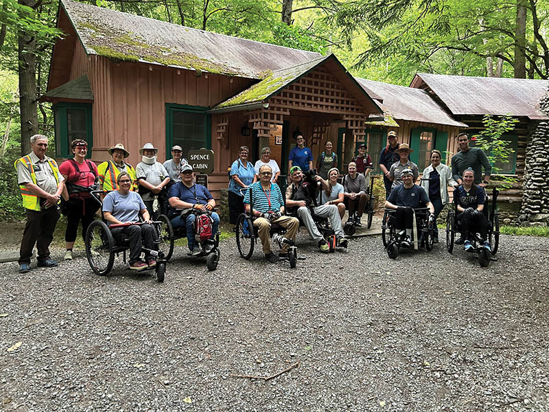 Participants gather for an adaptive Firefly Night Hike at Elkmont in Great Smoky Mountains National Park.