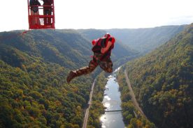The shores of the winding New River Gorge serve as the landing place for hundreds of Bridge Day adventurers.